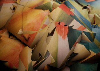 a large pile of multicolored pieces of paper