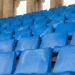 rows of blue chairs