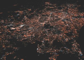 lighted city at night aerial photo