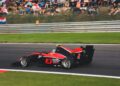 red and black go kart on track